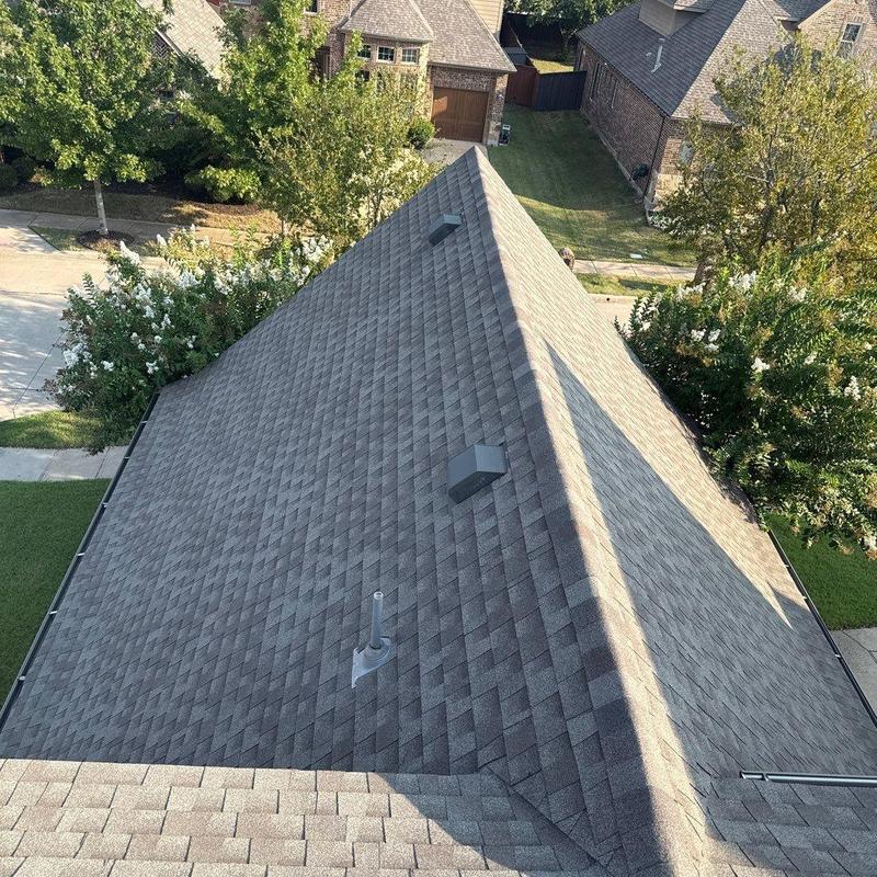 Asphalt shingle roof with sealed nails and penetrations
