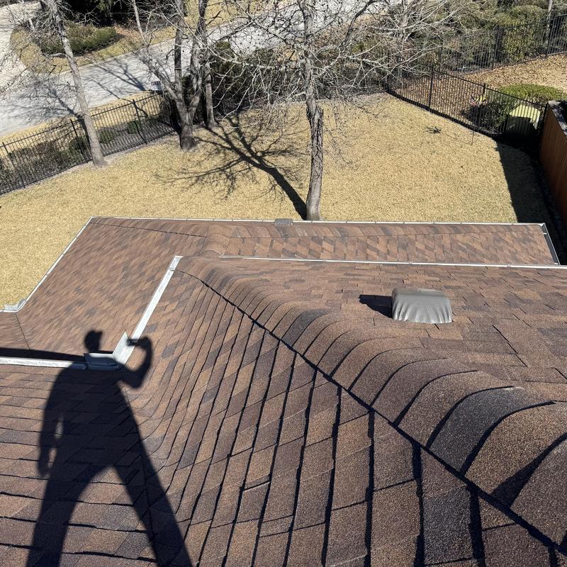Architectural asphalt shingle roof with vent pipe boot installed