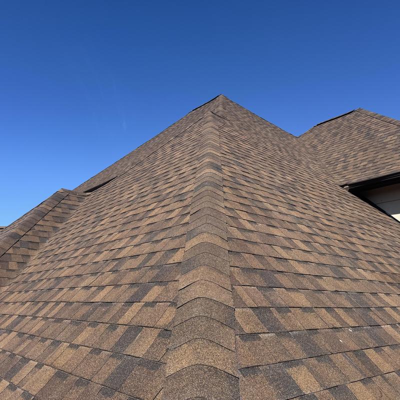 Architectural asphalt shingle roof with ridge cap installation