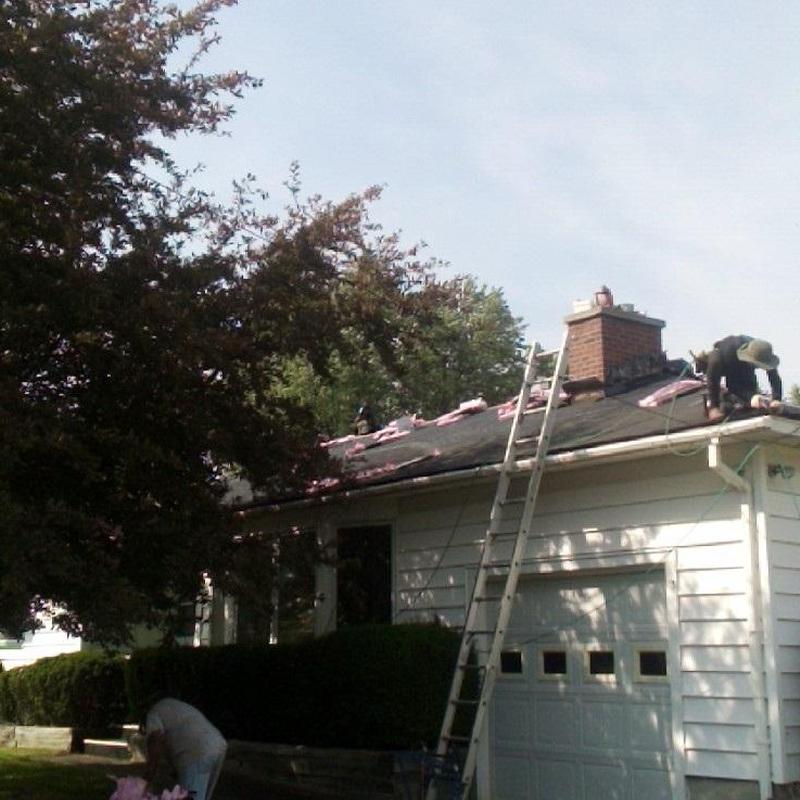 Asphalt shingle roof under installation on house in Vermont