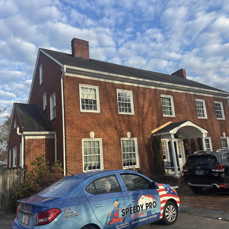Shingle roof on residential brick house in Blountville