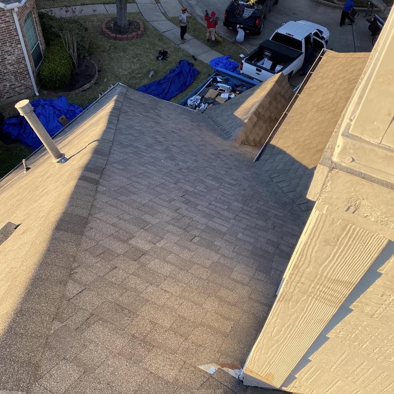 Architectural shingle roof with new flashing installed