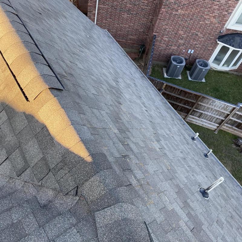 Architectural shingle roof with ridge and vent pipes