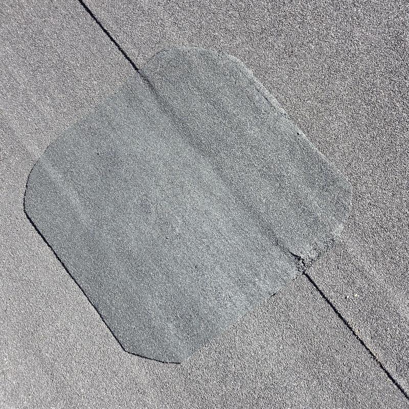 Flat roof hot patch on nail pop area
