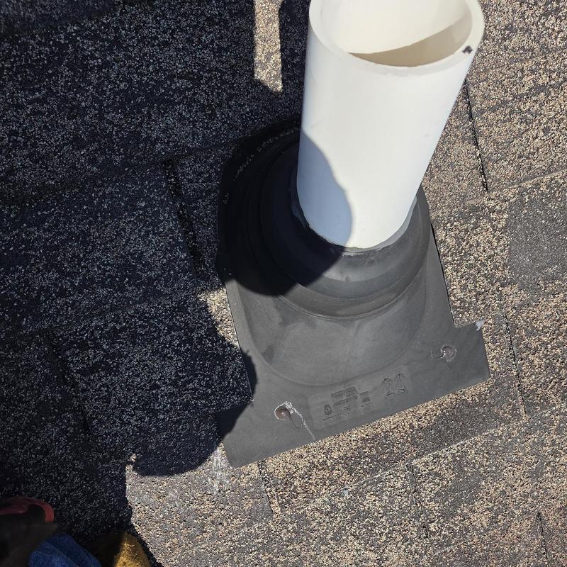 Roof vent pipe with new flashing and shingles