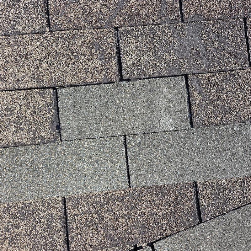 Roof shingles showing replacement and sealing details