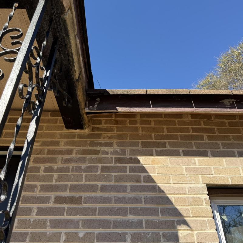 Wood fascia on house exterior with visible damage