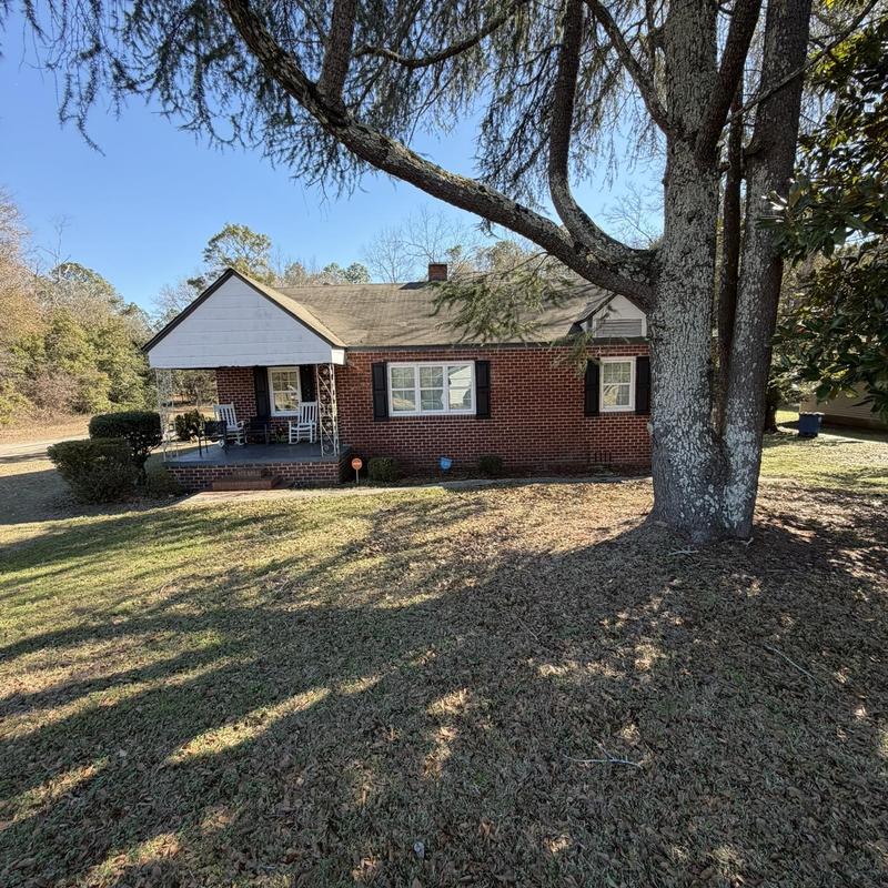 Roof replacement and decking repair on brick house