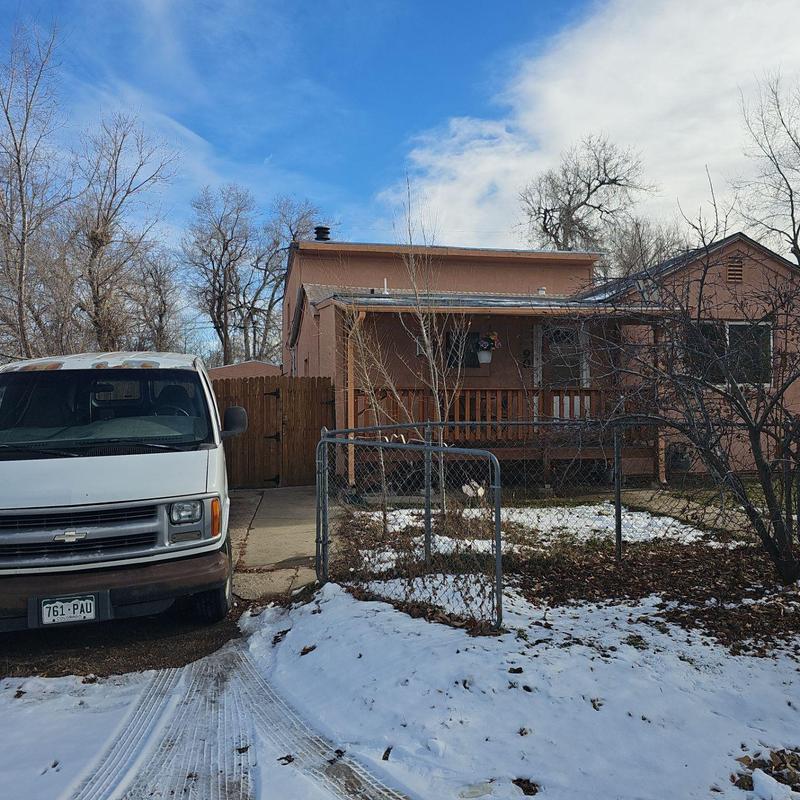 Roof hail damage inspection on brown house Roof hail damage inspection on brown house