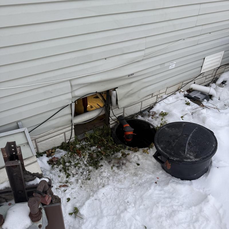 Pipe heat tape installation and insulation near crawlspace
