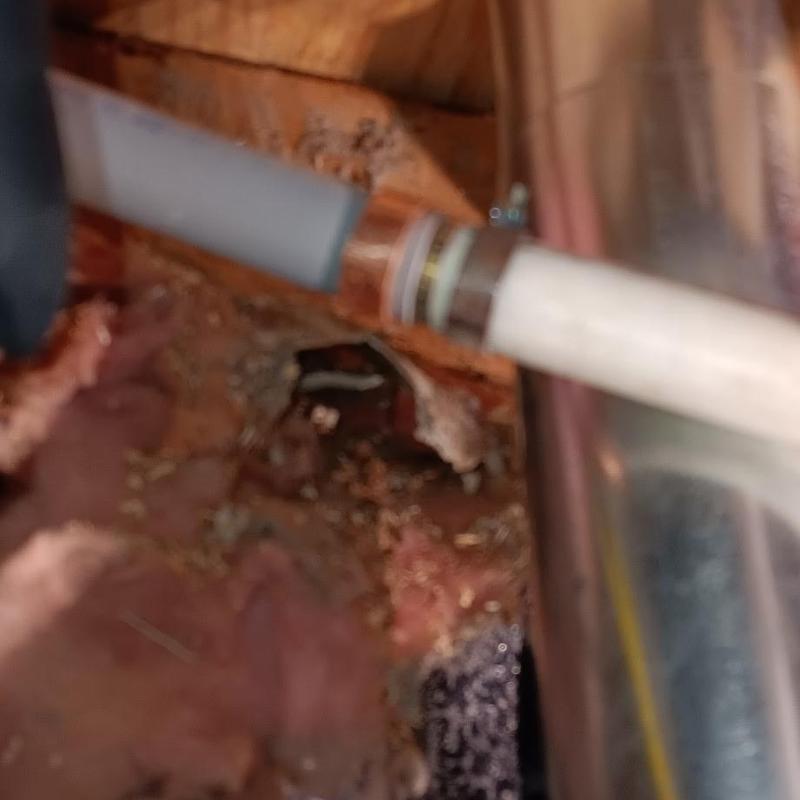 Copper water pipe connection with insulation in crawl space
