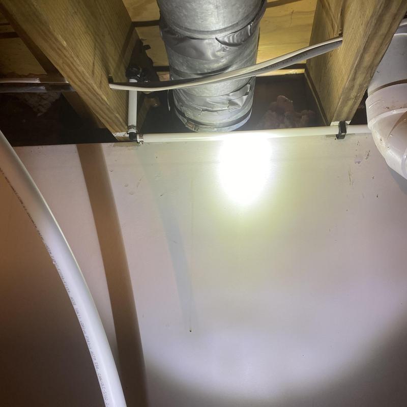 Pex water supply line installed under floor joists