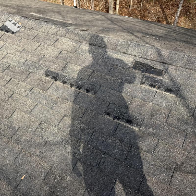 Roof with missing and brittle 3-tab shingles