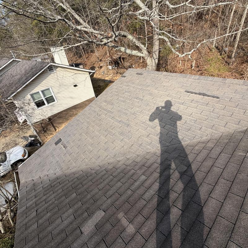3-tab roof with missing shingles and deteriorated pipe boots