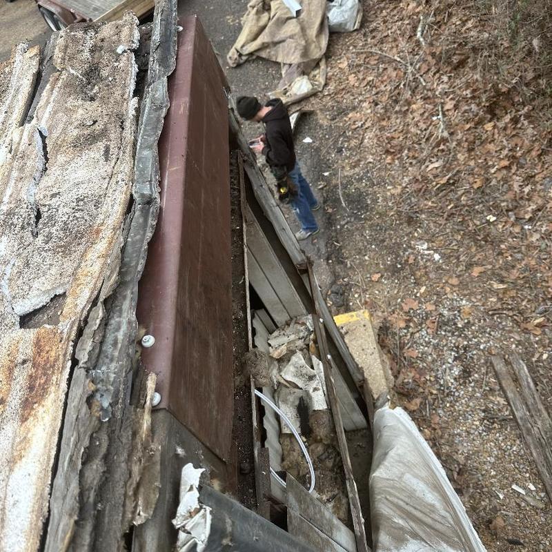 Roof panels and wall siding removal and debris cleanup Roof panels and wall siding removal and debris cleanup