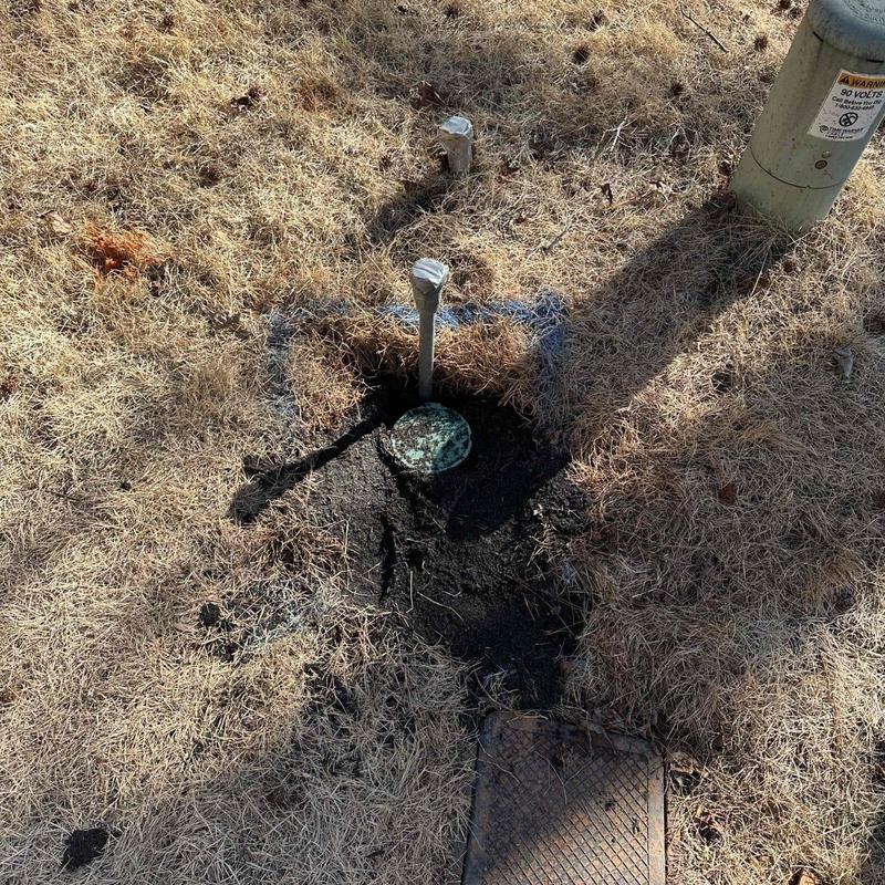 Buried capped pipe excavation with vacuum truck access Buried capped pipe excavation with vacuum truck access