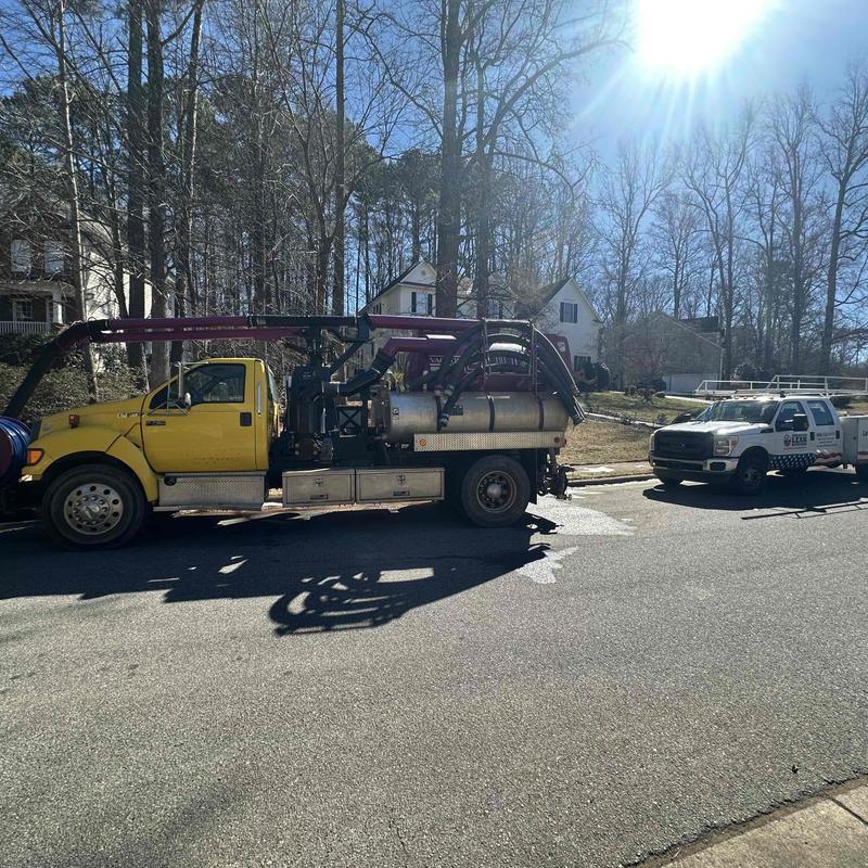 Vacuum truck system with excavation on street site Vacuum truck system with excavation on street site