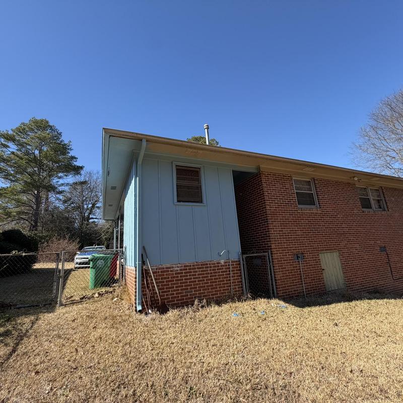 Wood fascia and soffit repair with gutter removal
