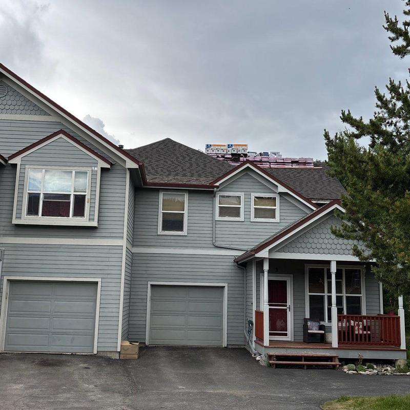 Owens Corning Duration Flex shingles stacked on roof