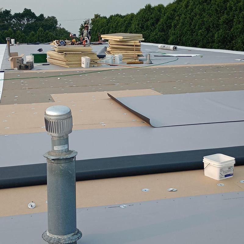 TPO roofing membrane installation on flat roof TPO roofing membrane installation on flat roof
