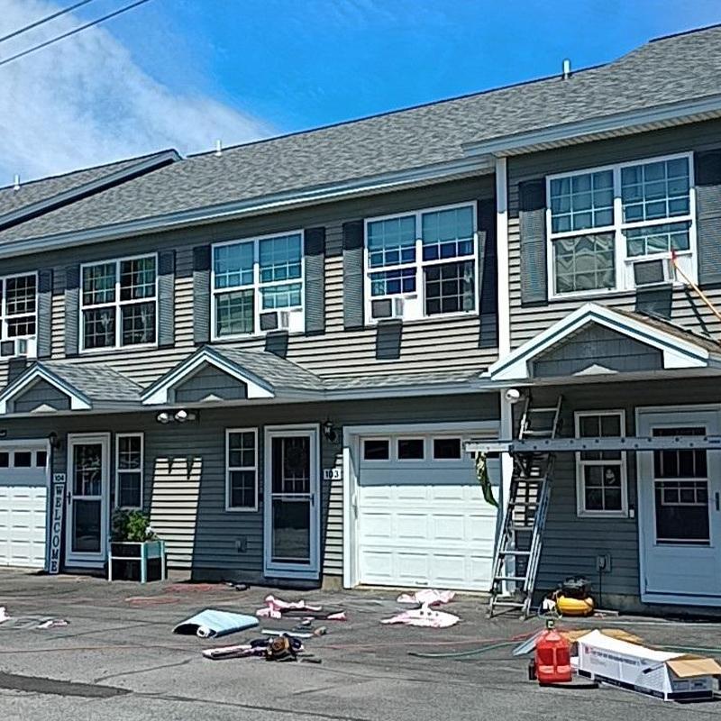 Asphalt shingle roofing on Milton condominium buildings