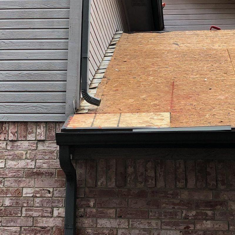 Roof decking replacement near gutter downspout hole