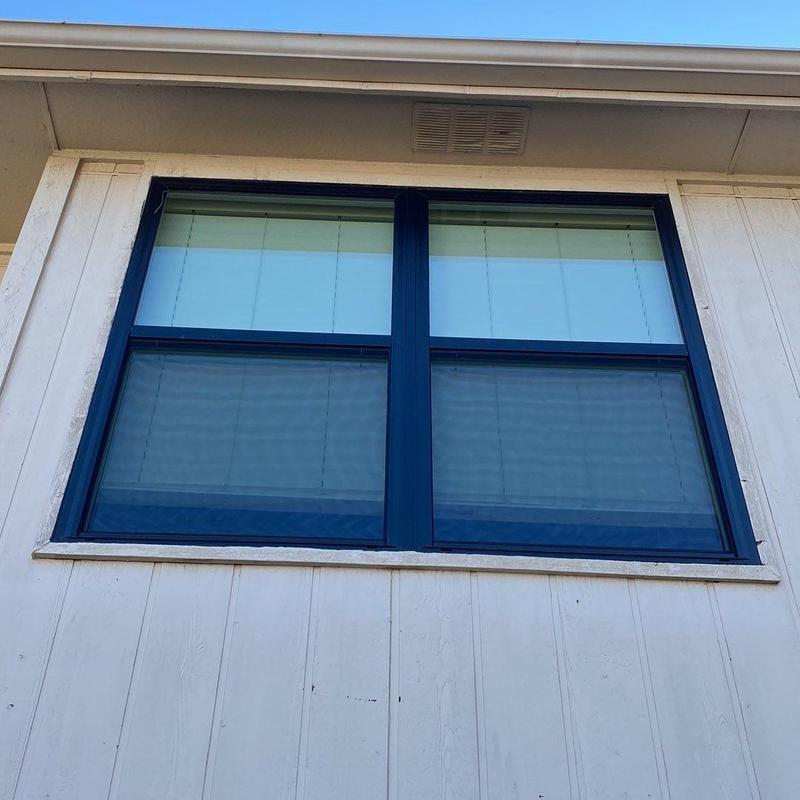 Burris vinyl double-pane window with black frame exterior