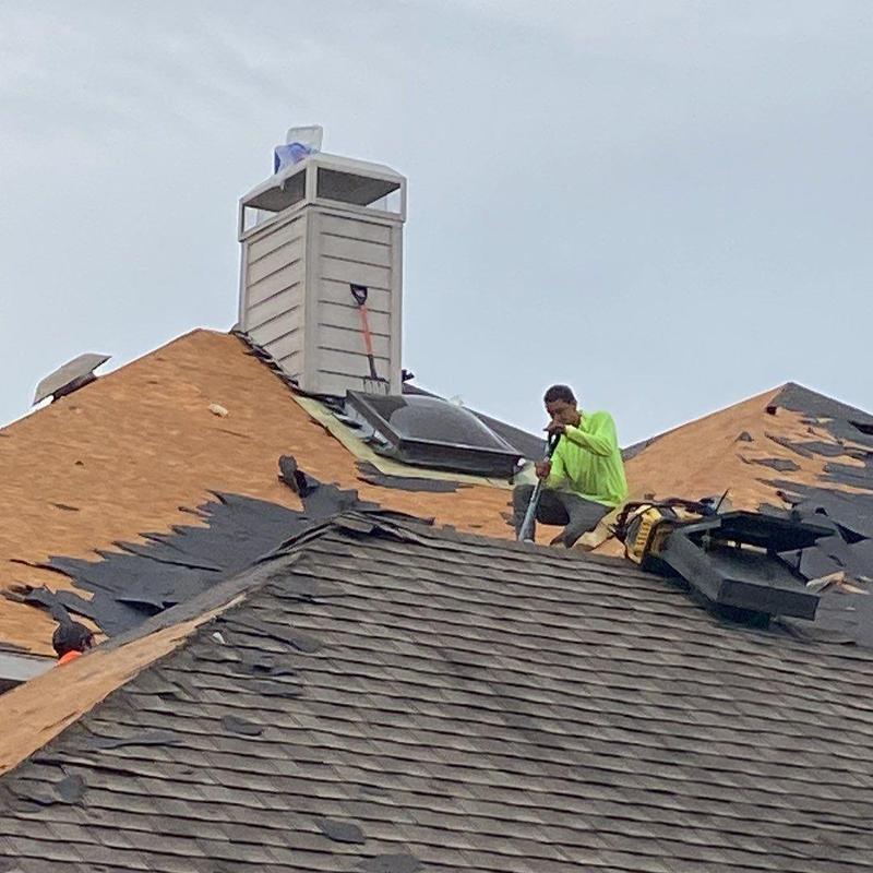 GAF Armorshield II roof shingles being replaced