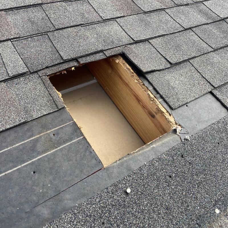 Static roof vent removal exposing roof decking and shingles