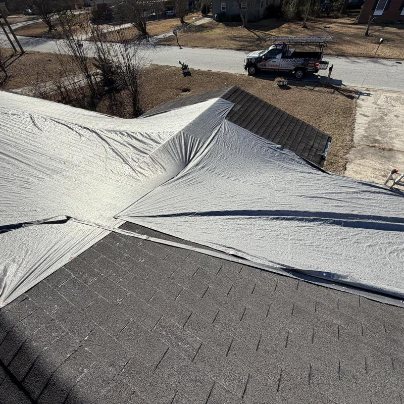 Roof tarp covering for protection during inspection