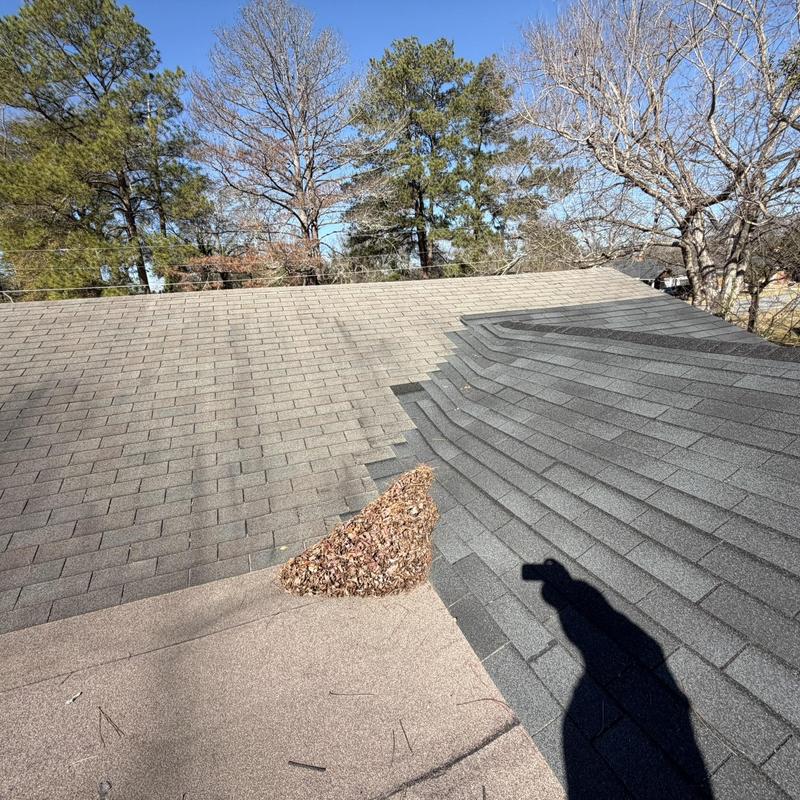 Asphalt shingle roof and rolled roof replacement in progress