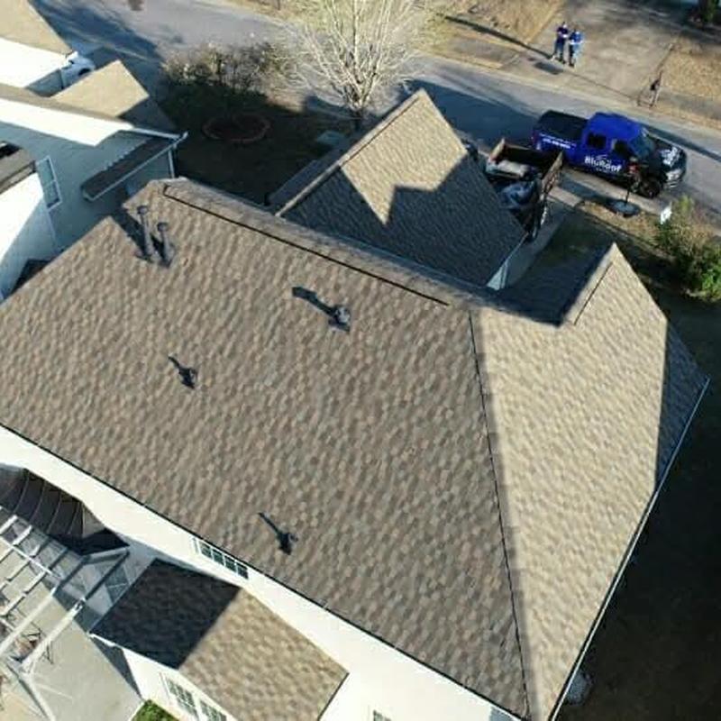 Asphalt shingle roof replacement with ventilation pipes Asphalt shingle roof replacement with ventilation pipes
