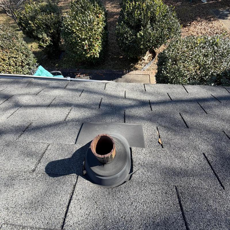 Roof ventilation pipe without rain cap on shingle roof