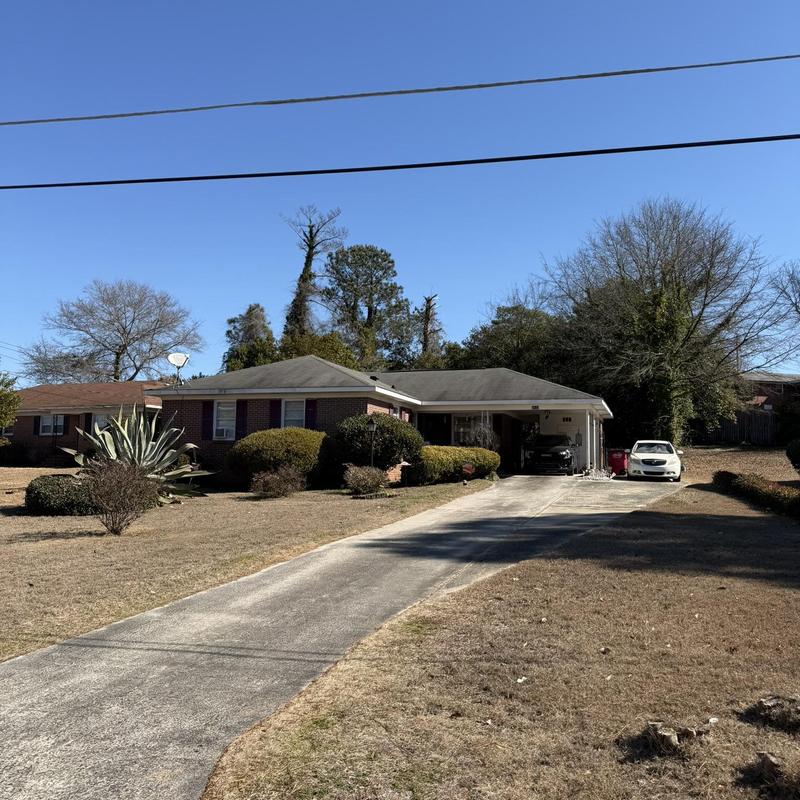 Roof replacement needed on one-story brick house