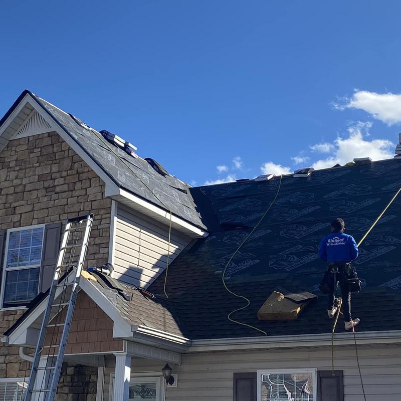 Asphalt shingle roof installation with safety harness