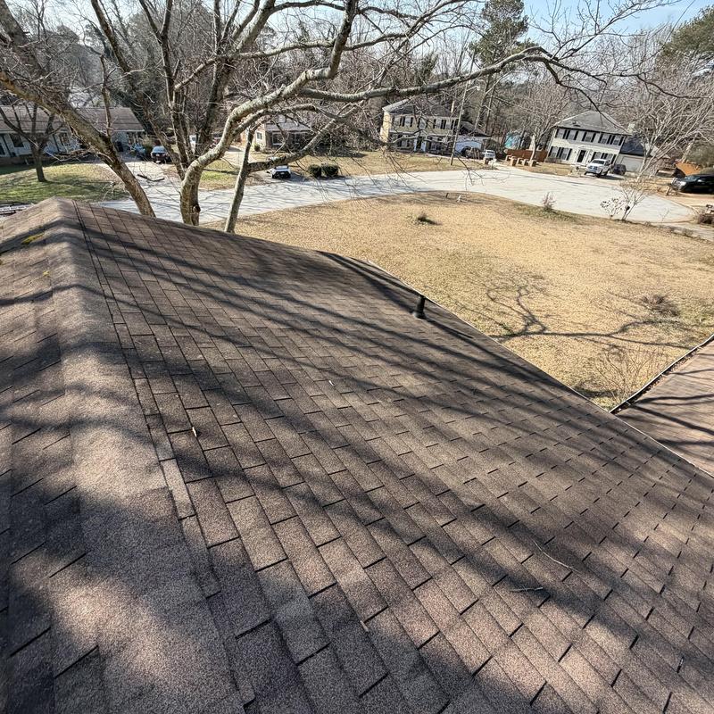 Three-tab roof inspection with clogged gutters in Loganville
