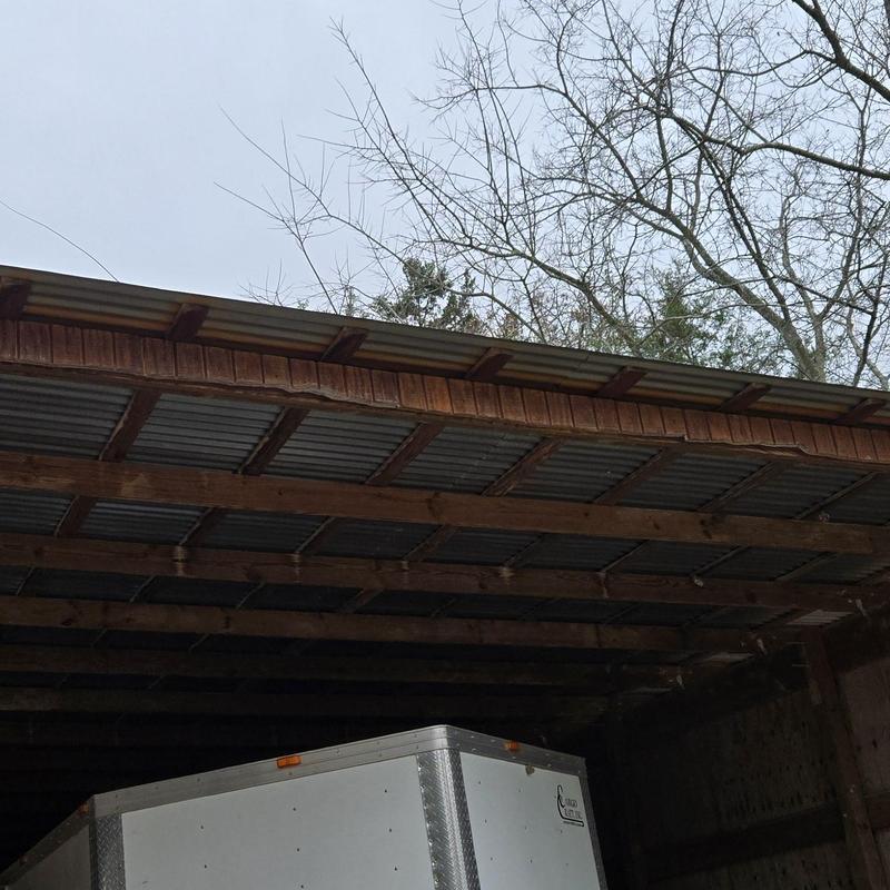 Metal carport roofing inspection for hail and wind damage