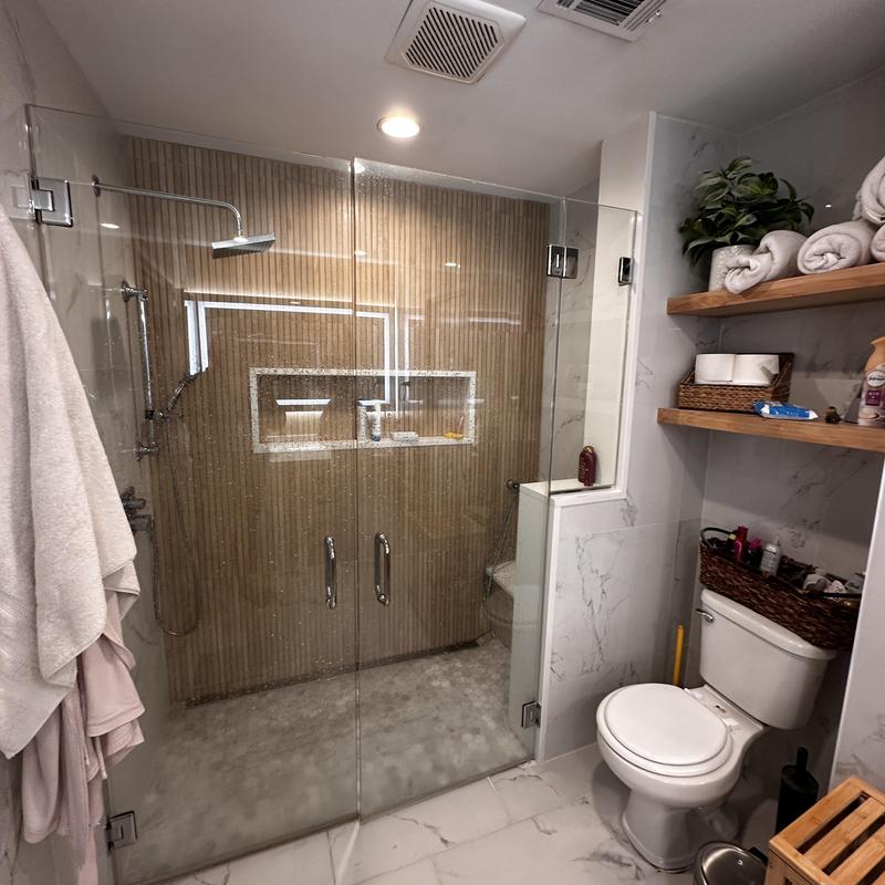 Groutless shower enclosure with rain showerhead Groutless shower enclosure with rain showerhead