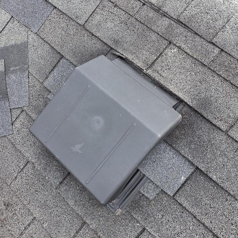 Box vent and asphalt shingles on roof decking