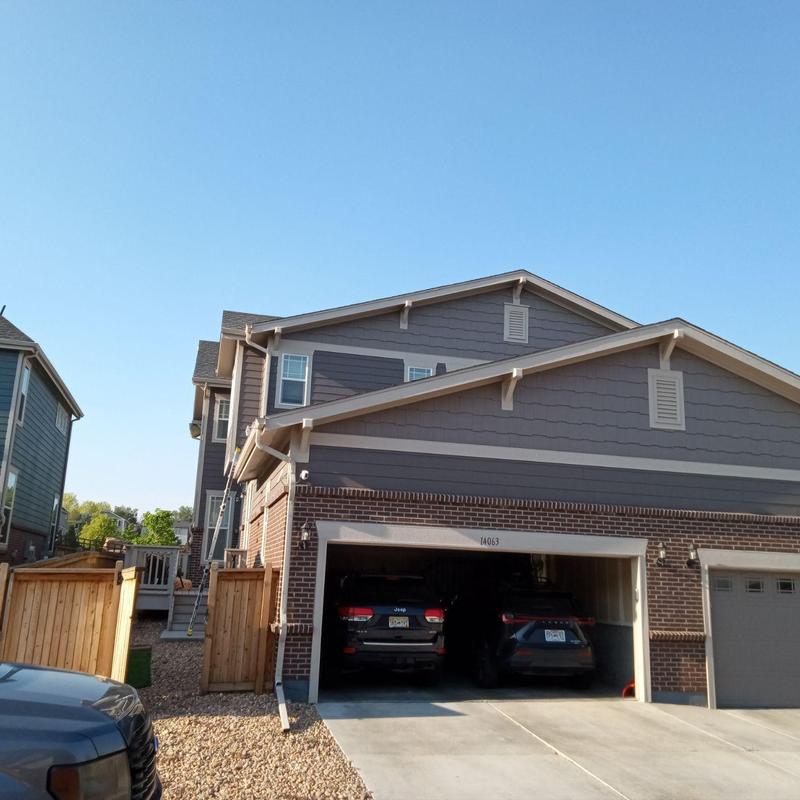 Roof shingles hail damage inspection on residential home Roof shingles hail damage inspection on residential home