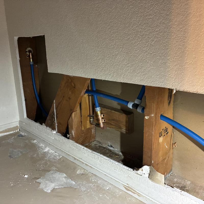 Cold water line reroute behind drywall in garage Cold water line reroute behind drywall in garage