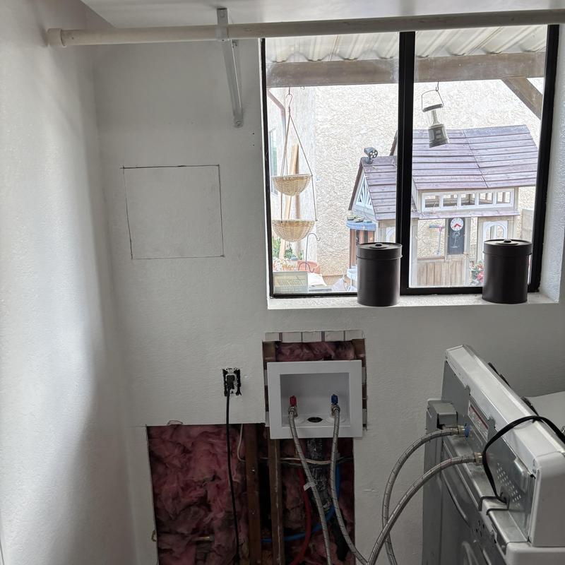 Hot and cold water lines reroute in laundry room wall Hot and cold water lines reroute in laundry room wall