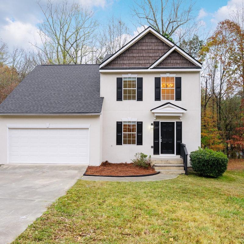 Asphalt roof replacement on two-story home in Fairburn, GA