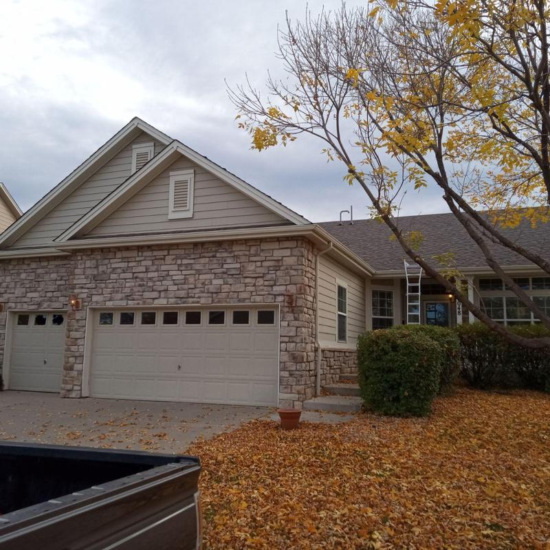 Roof with hail inspection ladder and fall foliage Roof with hail inspection ladder and fall foliage