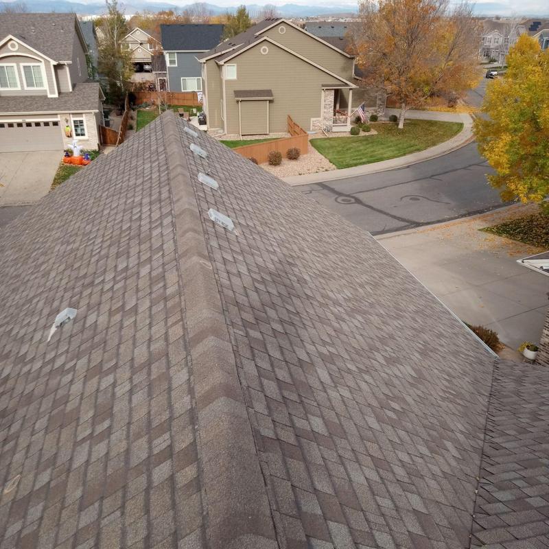 Asphalt shingle roof inspection showing no hail damage Asphalt shingle roof inspection showing no hail damage