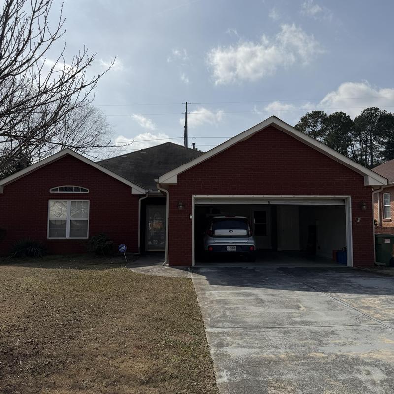 3-tab shingle roof with missing and damaged shingles