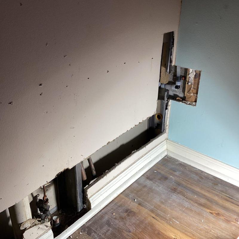 Cold water line overhead loop with wall access panel