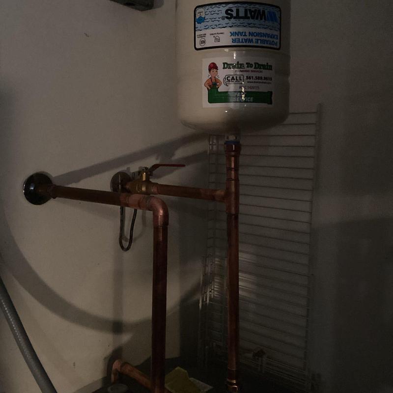 Expansion tank with copper piping and valve installation