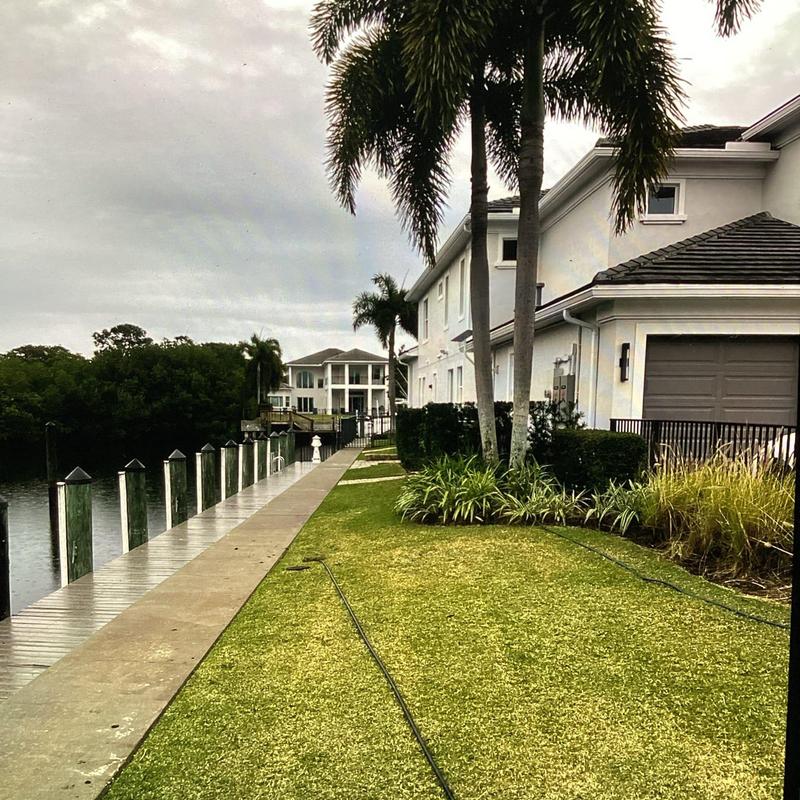 Residential drainage system with yard and dock view