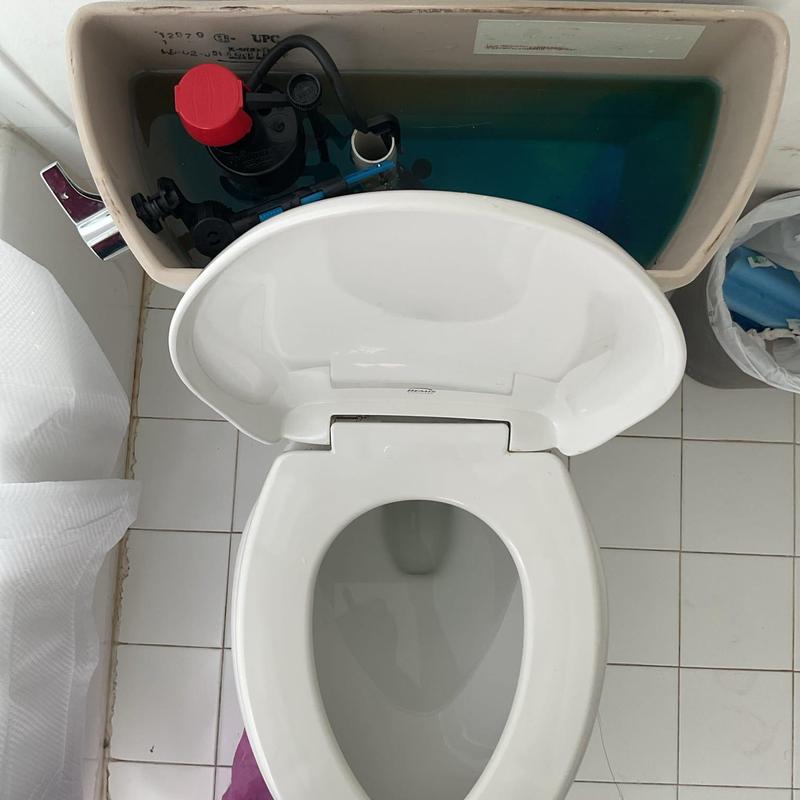 Toilet tank interior with new angle stop valve installation